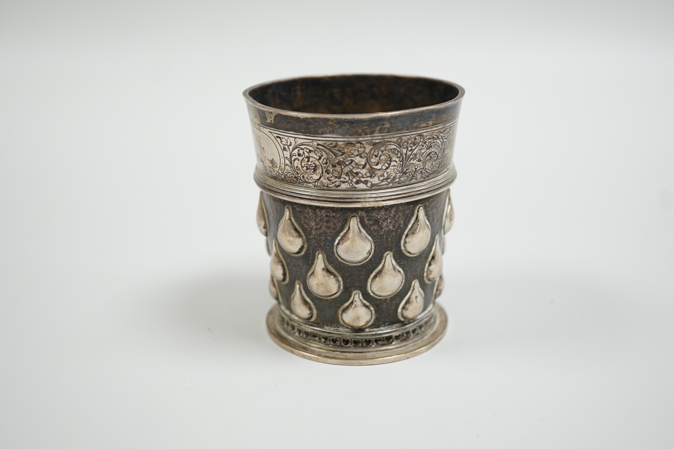 A Swiss 875 standard white metal beaker, by I. Bossard, embossed with field of pears and engraved band of hearts, 86mm, 5.9oz.